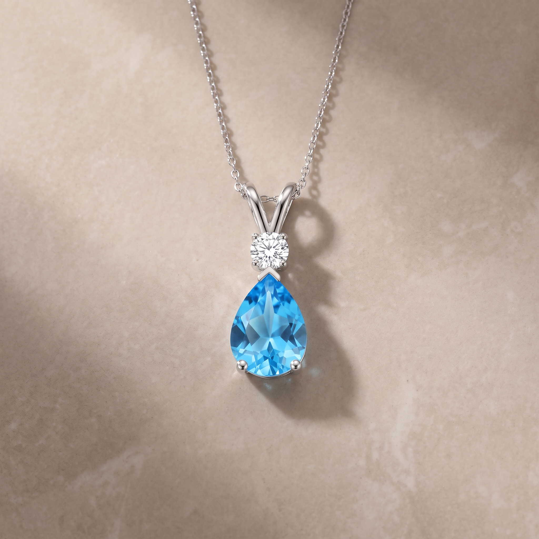 Prong-Set Swiss Blue Topaz Teardrop V-Bale Pendant with Diamond by Angara